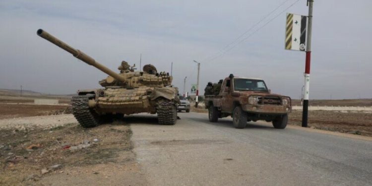 Syrian rebel assault widens as Assad races to defend Homs, Damascus