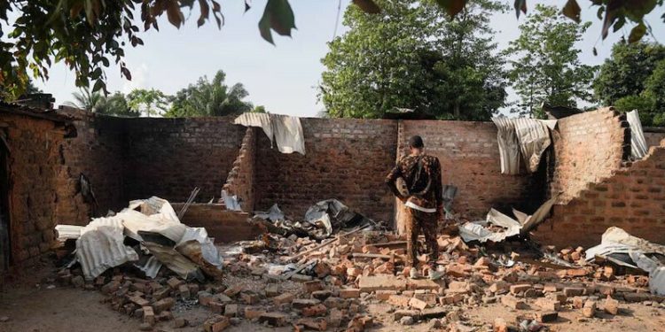Charred bodies, shattered lives after gunmen kill 100 in Nigeria
