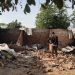 Charred bodies, shattered lives after gunmen kill 100 in Nigeria