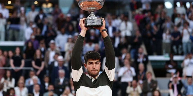 Alcaraz saves three match points to beat Sinner to French Open title