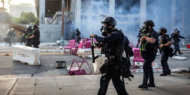 Los Angeles police order immigration protesters downtown to go home