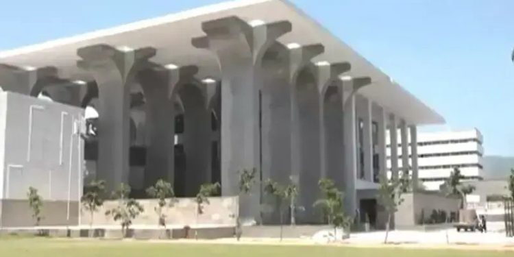 ISLAMABAD: The Federal Constitu­tional Court’s (FCC) jurisdiction to hear intra-court appeals (ICAs) came under question on Monday when a senior counsel objected to the court taking up appeals that had earlier been filed under the Supreme Court (Practice and Procedure) Act, 2023.

“If the FCC hears and decides ICAs that were moved against decisions of the Supreme Court, it will create the impression that the court is sitting as an appellate forum over Supreme Court judgements, whereas the 27th Constitutional Amend­ment contains no such provision,” argued senior counsel Ibad-ur-Rehman Lodhi.

Consequently, Chief Justice Aminuddin Khan, who was heading a six-member FCC bench, adjourned the proceedings to allow the counsel to file an appropriate petition on the matter. The counsel later told Dawn that he would file a miscellaneous application within the present ICA instead of submitting a separate petition.


The issue arose when the FCC bench, also comprising Justices Syed Hasan Azhar Rizvi, Ali Baqar Najafi, Muhammad Karim Khan Agha, Rozi Khan Barrech and Arshad Hussain Shah, took up a set of ICAs concerning the All Public Universities BPS Teachers Association (APUBTA), an organisation that had earlier highlighted vacant positions across public-sector universities, including vice-chancellors, presidents, vice presidents, registrars, faculty heads, department heads, controllers of examination, and directors of finance.

Question of jurisdiction surfaces when court takes up varsity teachers’ appeals

When the case was taken up, Advocate Lodhi representing one of the petitioners, vice chancellor Dr Akhtar Ali Kalhoro of the NFC Institute of Engineering, Multan, argued that the FCC could not hear the matter because the appeal had been filed under Section 5 of the SC (Practice and Procedure) Act, 2023.

He contended that the matter should instead be referred back to the SC, which had issued adverse remarks against the petitioner. However, the CJ reminded him that the SC could no longer hear petitions filed under Article 184(3), which relates to the enforcement of fundamental rights, now omitted under the 27th Constitutional Amendment. “Where is Article 184(3) in the Constitution as it stands today?” Justice K.K. Agha asked.

The counsel responded that at the time the appeal was filed before the SC, Article 184(3) was still in effect, even though Article 175(E) now vests original jurisdiction in the FCC to hear such matters. He noted that no appeal or petition under Article 175(E) was pending before the SC that would require transferring cases to the FCC; rather, the appeals had been filed under Article 185 of the Constitution. Justice Najafi observed that the amendment had broadened the scope and concept of the Article, bringing such matters within the FCC’s domain.


“Confusion inevitably arises when matters are left to assumption,” the counsel argued, adding that lawmakers did not address this anomaly. He reiterated that the SC was not seized of any petition under Article 175(E) that would warrant transferring cases to the FCC after its creation.

“Why don’t you file a separate petition on this point?” Justice Najafi suggested.

The counsel replied that if the FCC proceeded with the appeal, it would give the impression that the court was acting as an appellate body over SC decisions. He added that Article 175(F) of the 27th Ame­ndment clearly states that the FCC may hear and determine appeals arising from judgements of a high court made under Article 199 — and not those of the SC.

During the hearing, the FCC also appeared constrained by the lack of readily available copies of the Pakistan Legal Decisions or the Supreme Court Monthly Review for quick reference to prior decisions. The bench had to rely on books provided by the counsel, with two judges sharing a single copy at a time.