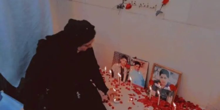 Relatives of APS victims mark 11th anniversary of school massacre with candlelight vigil