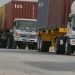 Transporters hold firm as talks continue