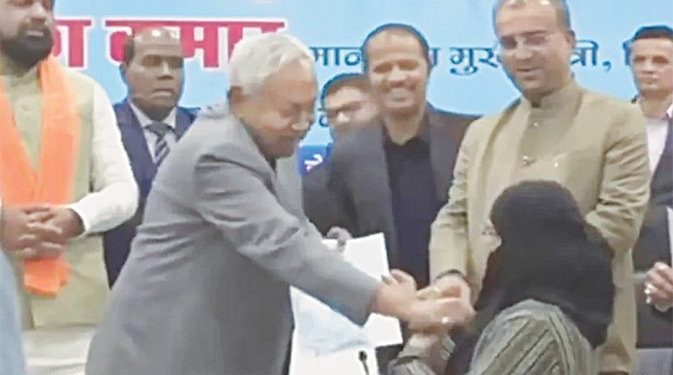 Calls for Bihar CM to quit after he ‘unveils’ Muslim woman