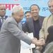 Calls for Bihar CM to quit after he ‘unveils’ Muslim woman