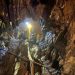 Rescuers pull 4 from flooded cave in Laos, 2 still missing